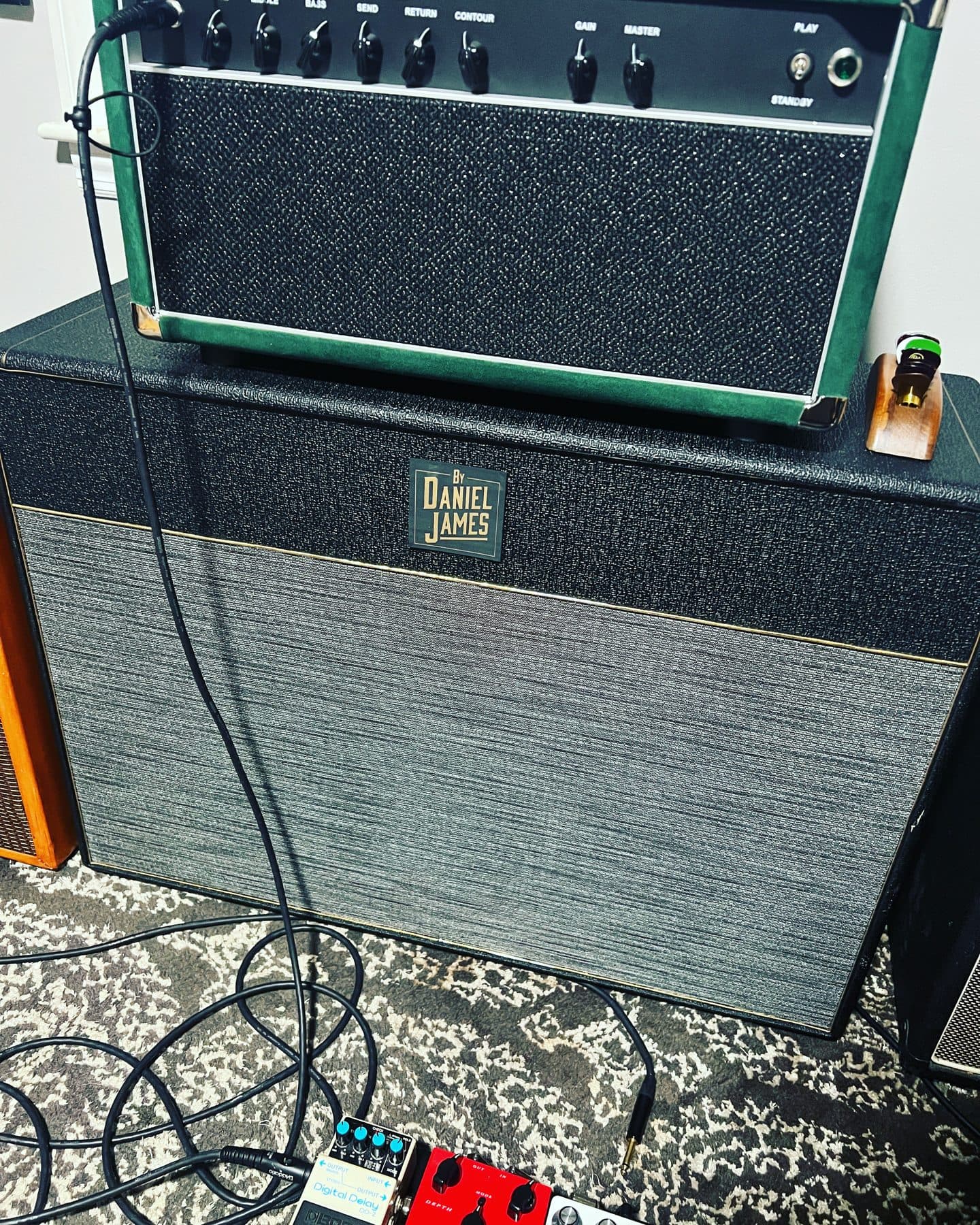 Green suede head on a Daniel James 2x12 cabinet with pedals